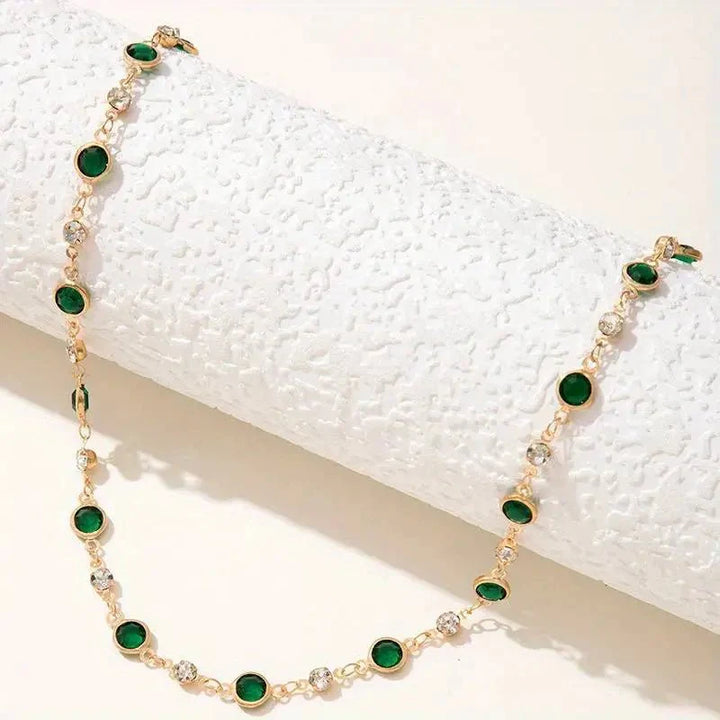 Skanto | Smaragd- og diamant-spaced choker-halskjede