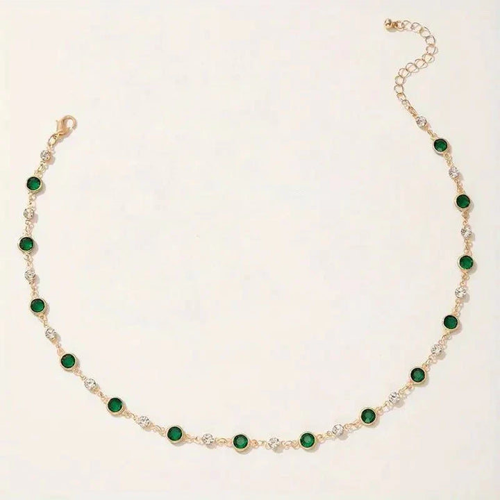 Skanto | Smaragd- og diamant-spaced choker-halskjede