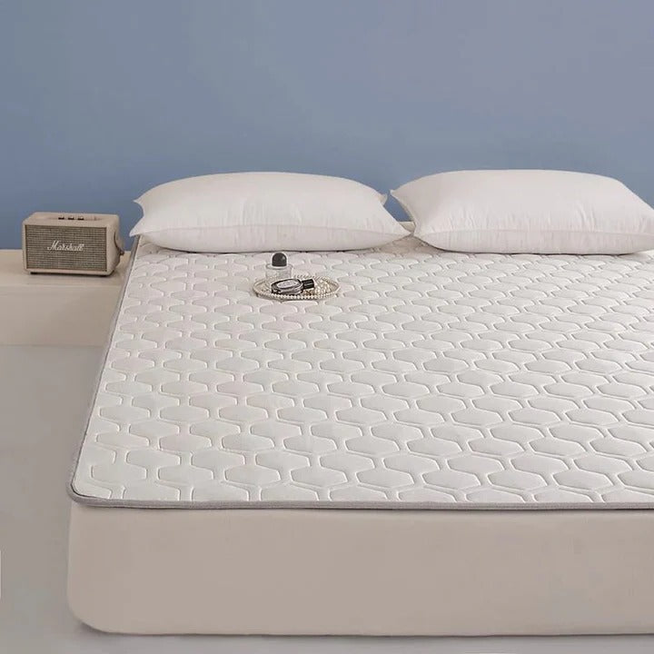Quilted Cooling Mattress Pad med Høydensitets Kjølefiber | Skanto