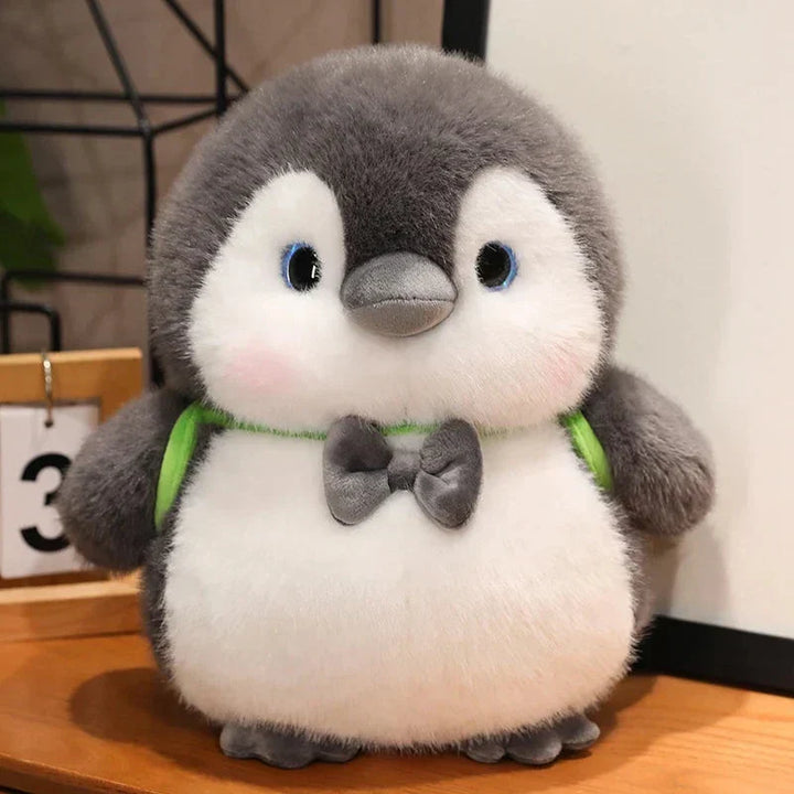 Skanto | Fluffy Grå Pingvin Plushie med Skilpadde Ryggsekk