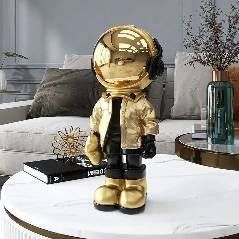 Moderne moderne astronautstatue i gullbelagt harpiksdekor | Skanto