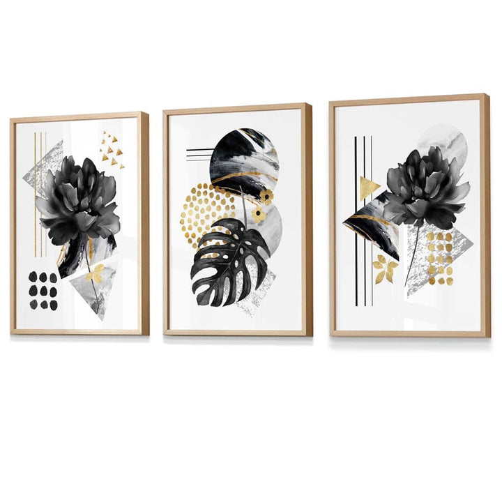 Abstrakte botaniske kunsttrykk i svart og gull / Innrammet