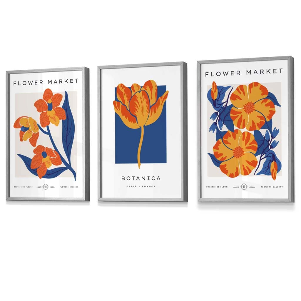 Innrammet veggkunst med temaet «Blått og oransje blomstermarked»