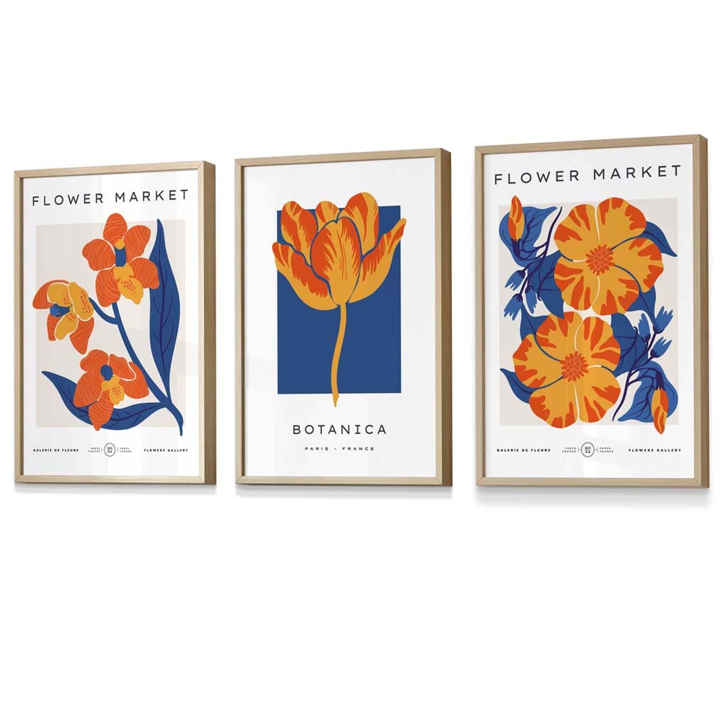 Innrammet veggkunst med temaet «Blått og oransje blomstermarked»