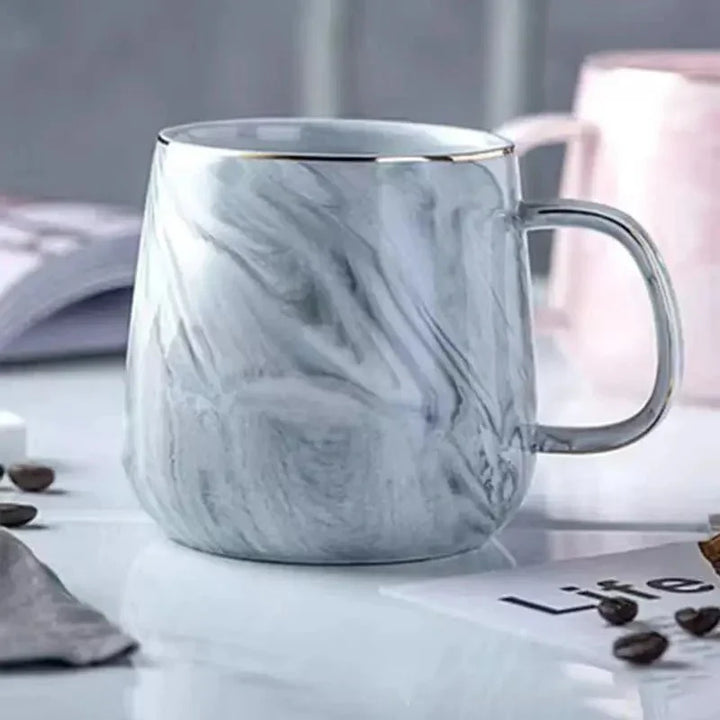Skanto | Kaffeekopp i keramikk i pastellfarge med marmor mønster