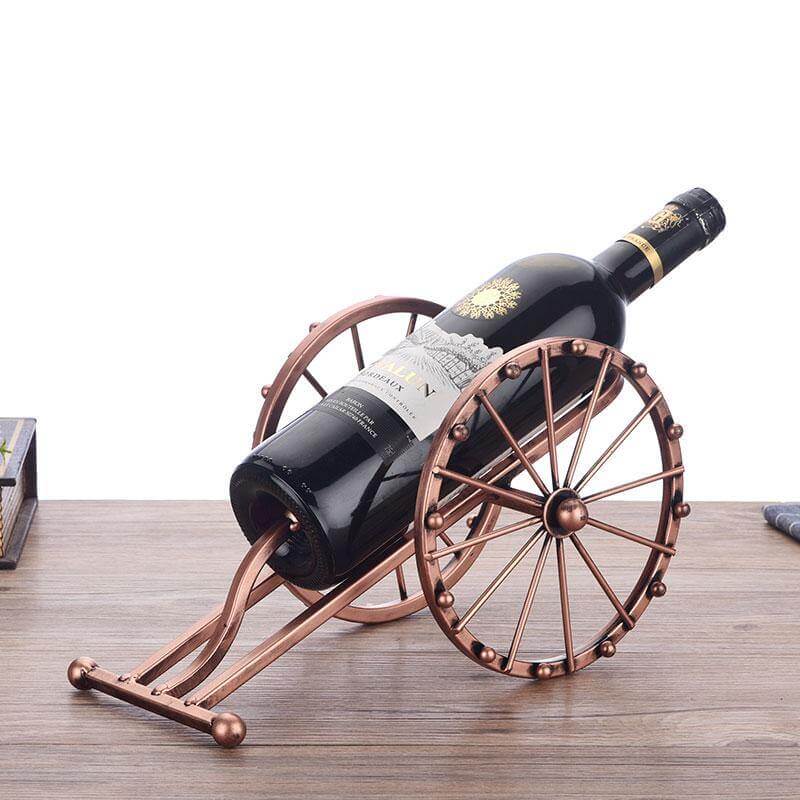 Antikk kanon vinflaskeholder