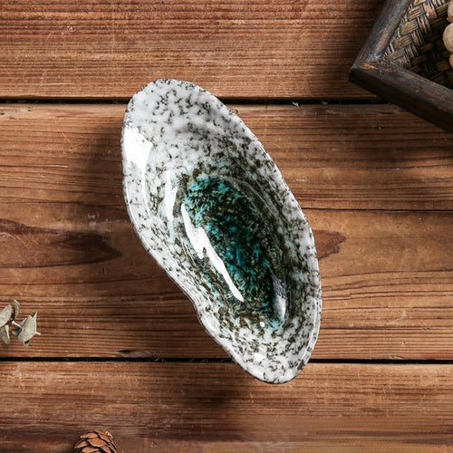 Skanto | Shellora – Elegant skallformet keramisk servise for stilfull dining