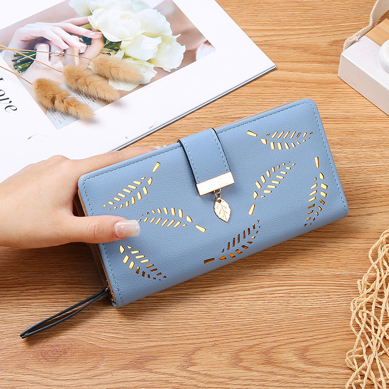 Skanto | Lang lommebok for kvinner med blader mønster