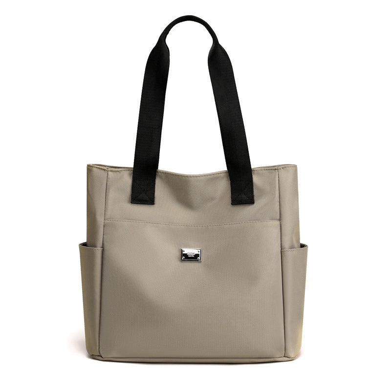 Skanto | Lett Vanntett Nylon Skulderveske