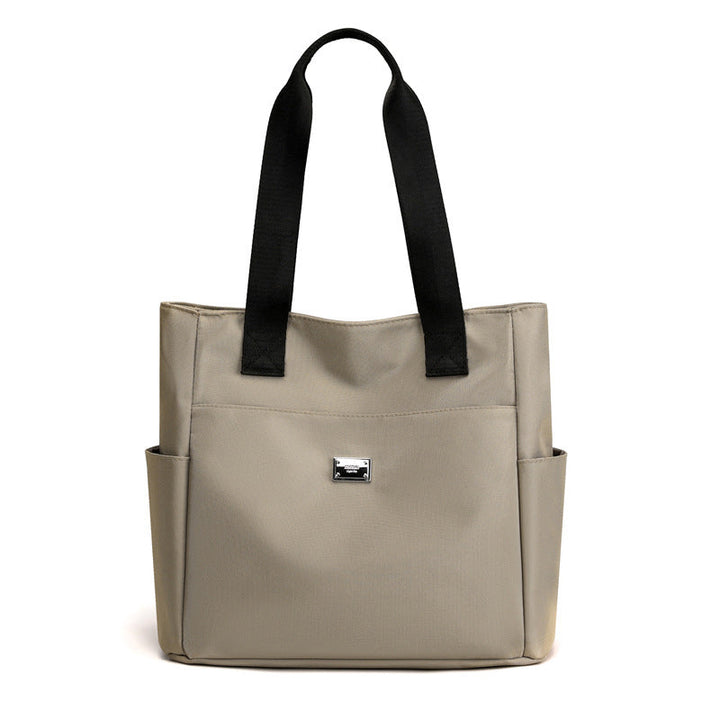 Skanto | Lett Vanntett Nylon Skulderveske