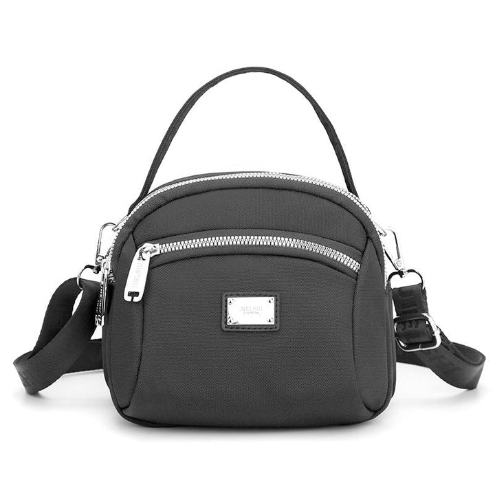 Skanto | Lett solid nylon skulderveske