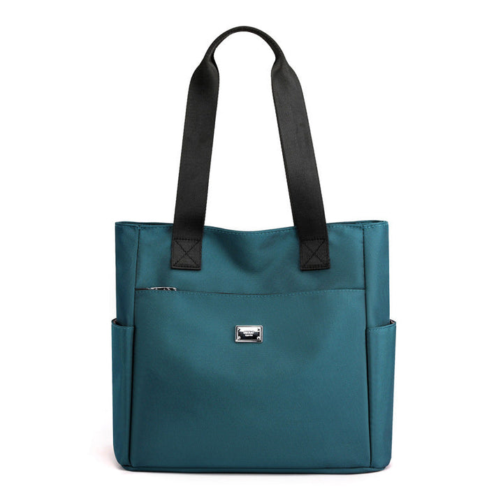 Skanto | Lett Vanntett Nylon Skulderveske