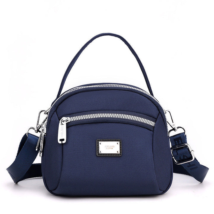 Skanto | Lett solid nylon skulderveske
