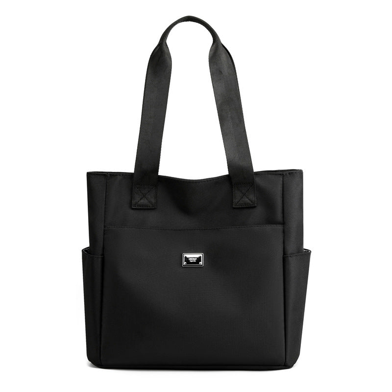Skanto | Lett Vanntett Nylon Skulderveske