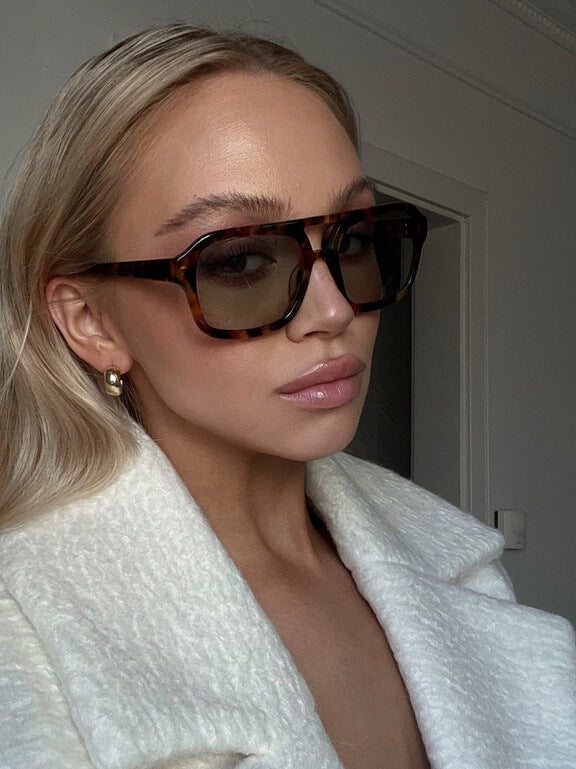 Vintage solbriller med UV-beskyttelse og retro sjarm – Loreen | Skanto