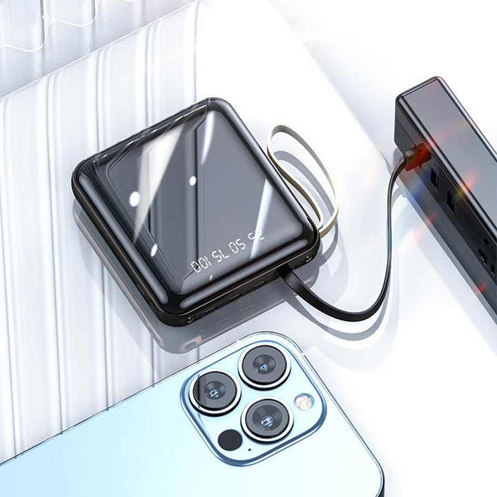 Skanto | Rask lading 20000mAh mini powerbank med integrerte kabler