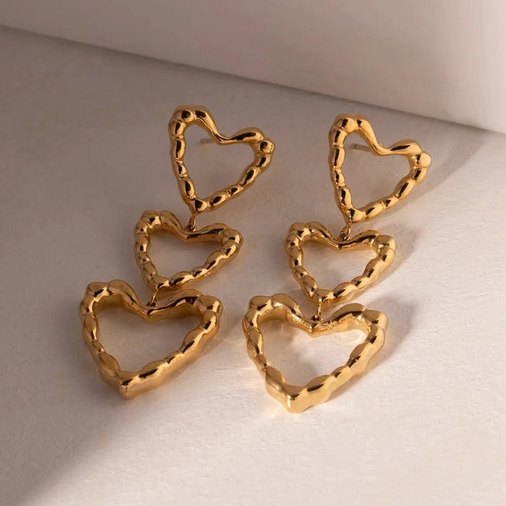 Skanto | Triple Uthevede Hjerter Dangle Øredobber
