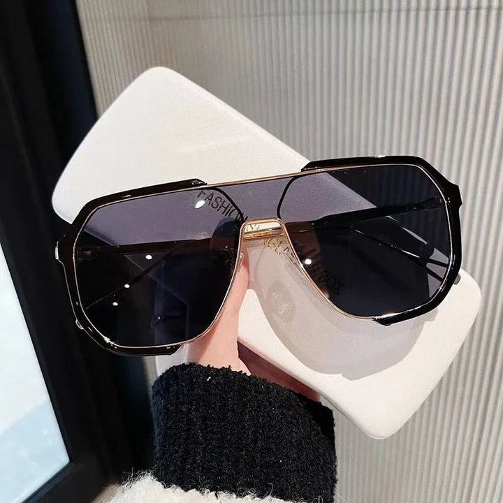 VOGUEVIEW SHADES – Übergroße quadratische Sonnenbrille med UV400- og photochromen Gläsern