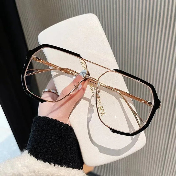 VOGUEVIEW SHADES – Übergroße quadratische Sonnenbrille med UV400- og photochromen Gläsern
